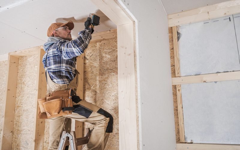 general-construction-contractor-attaching-drywall-using-cordless-drill-driver-caucasian-remodeling-worker-his-40s (1)